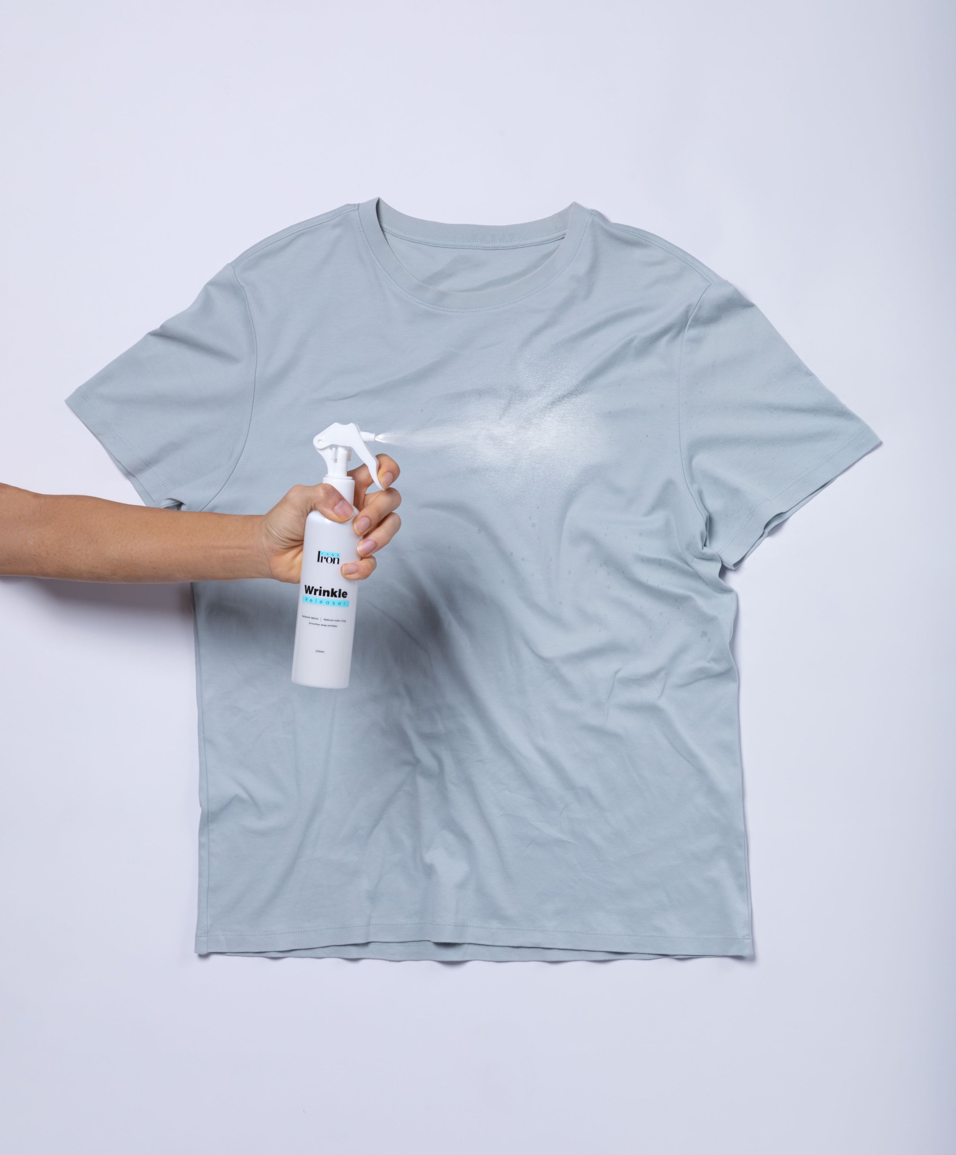 Step 1: Place your wrinkled clothes onto a flat surface. Spray EasyIron Spray over the wrinkled areas.